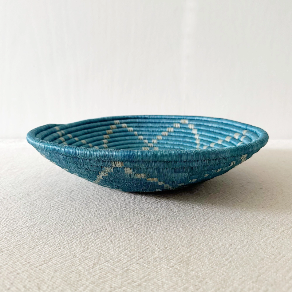 Fair trade basket blue with white star sweetgrass handmade by women in Rwanda.