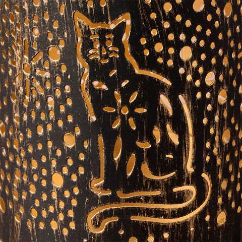 Fair trade metal tealight candle holder with cat design.