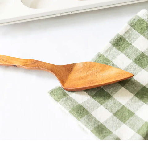 Fair trade wood cake server handmade in Guatemala.