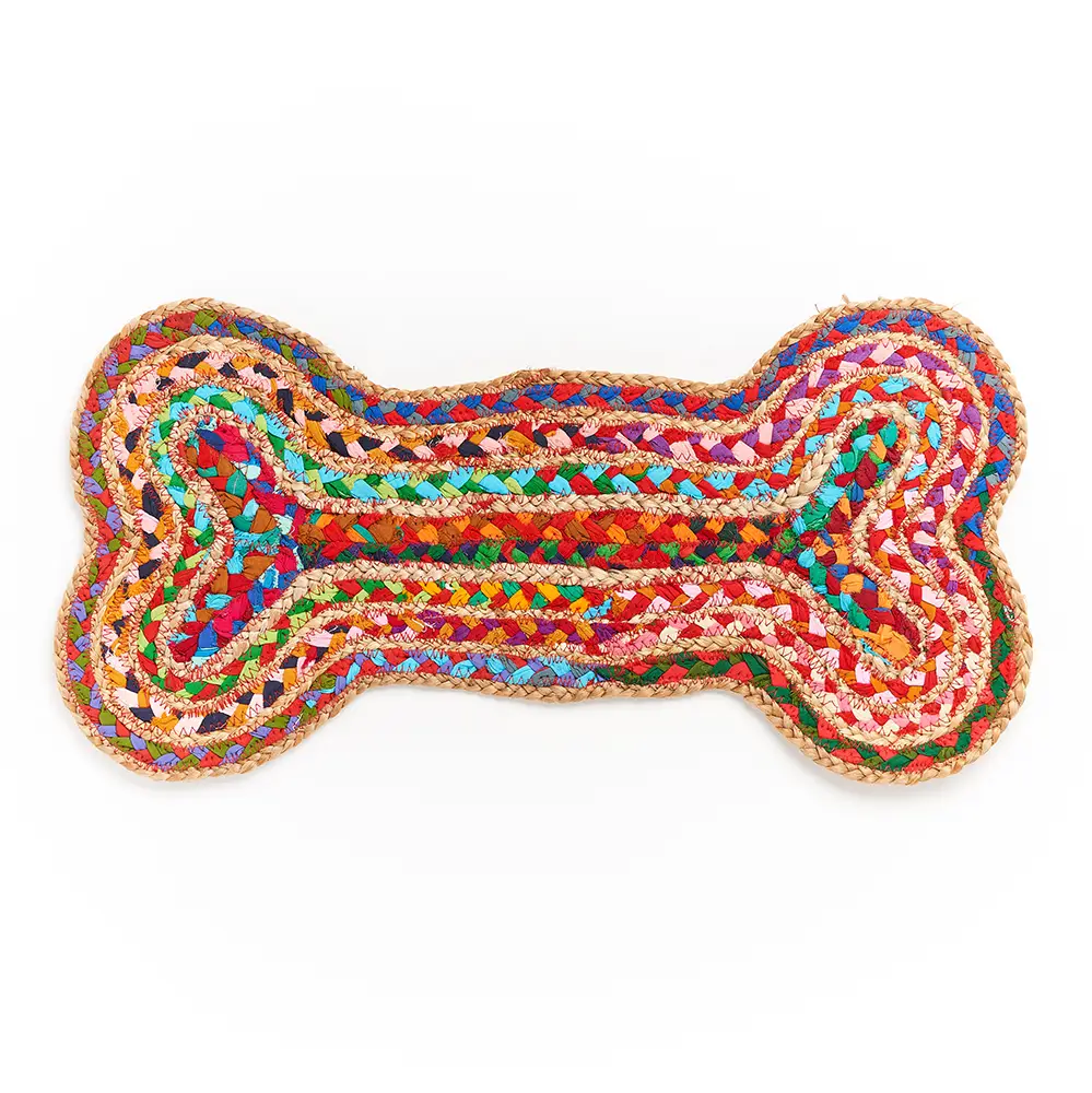 Handwoven recycled rug for dog feeding in bone shape and multicolored.