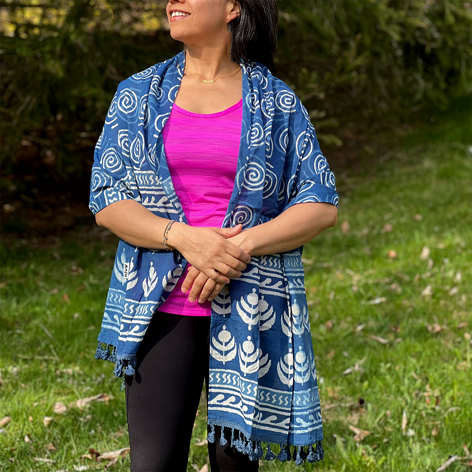 Fair trade cotton indigo scarf with flowers, spirals and pompoms.