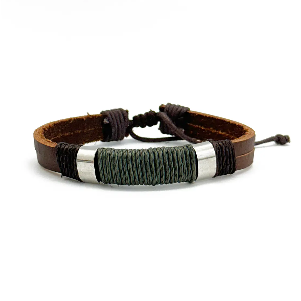 Leather bracelet with metal accents and green wrapping in the middle.  Adjustable slip knot closure.