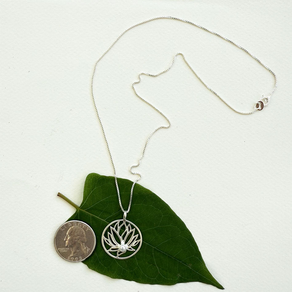 Fair trade sterling silver pearl lotus flower necklace.