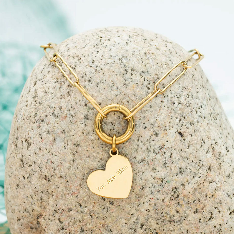 Heart necklace gold with pearl and chunky chain handmade by survivors of human trafficking.