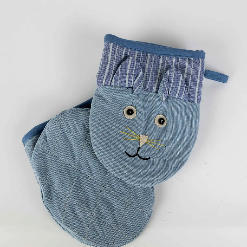 Set of 2 fair trade oven mitts with a cat design in blue colors.