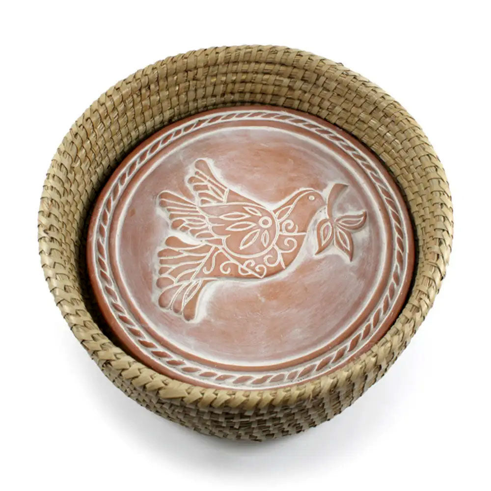Fair trade peace dove bread warmer with terra cotta stone.