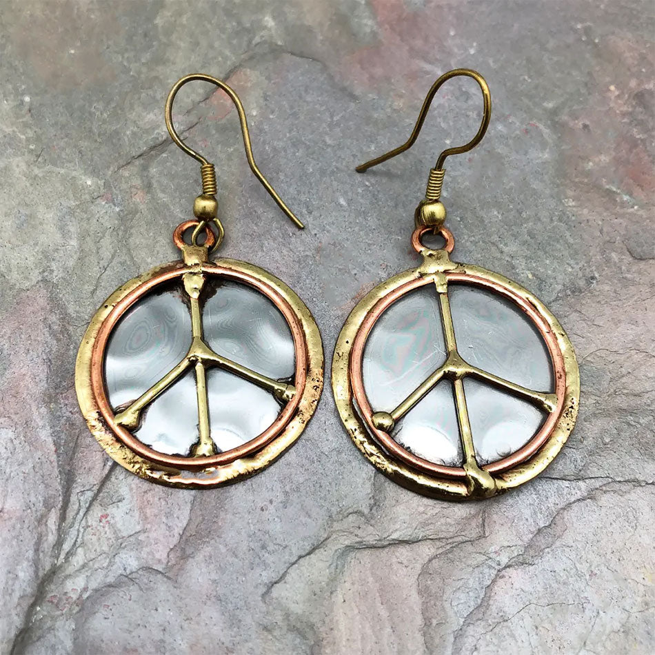 Fair trade peace sign earrings in brass, copper and stainless steel.