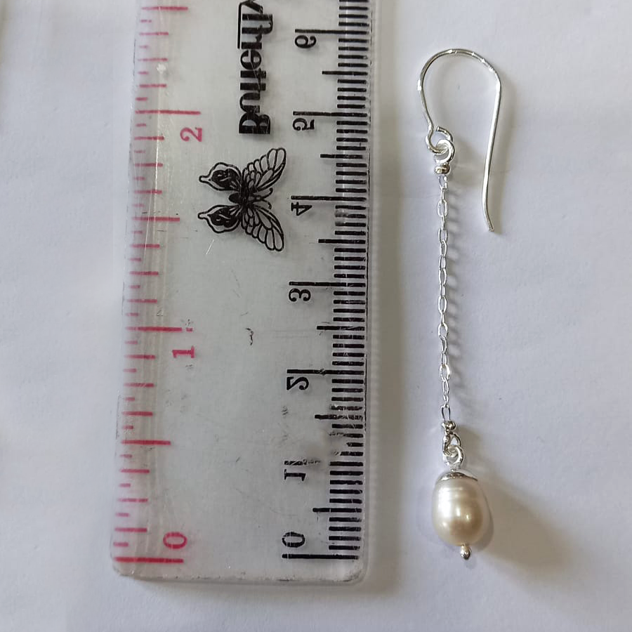 Sterling silver earrings with chain and pearl on the bottom.