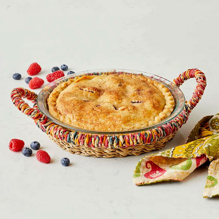 
Fair trade pie holder handmade out of recycled sari fabric and grasses.