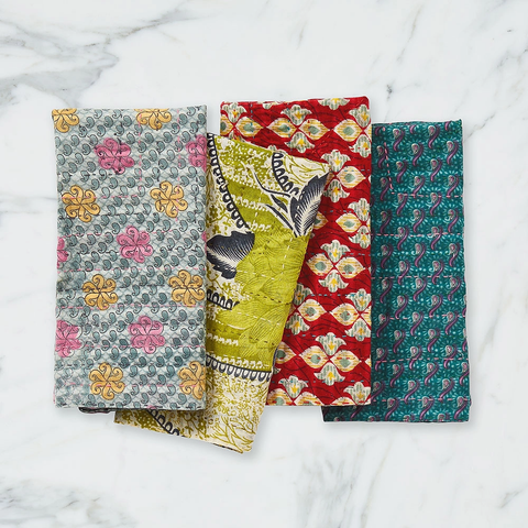 Fair trade napkins handmade from recycled sari fabric in India.