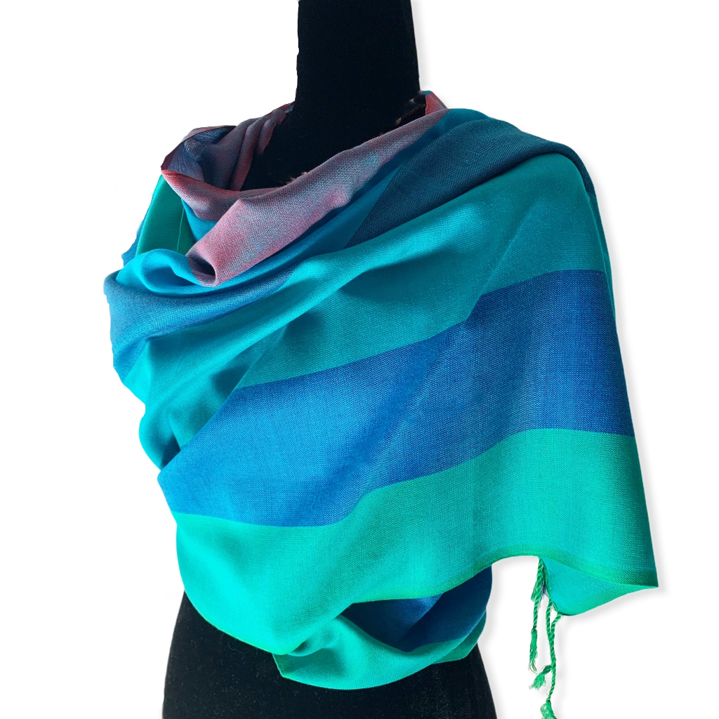 The scarf is large enough to wear as a wrap for those cool days and nights, as well as around the neck. 