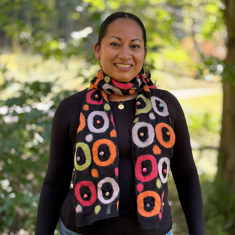 Fair trade silk felted black scarf with orange, purple and green circles.
