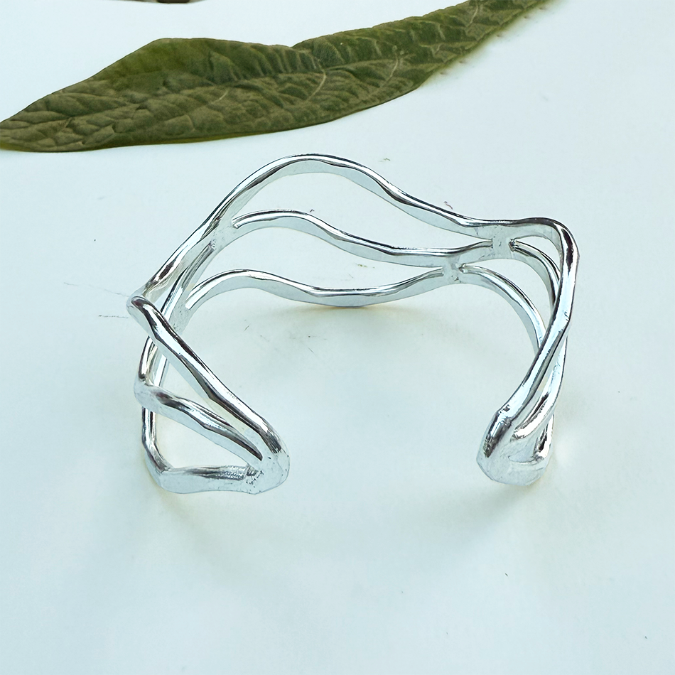 Silver-plated brass hammered cuff adjustable fair trade.