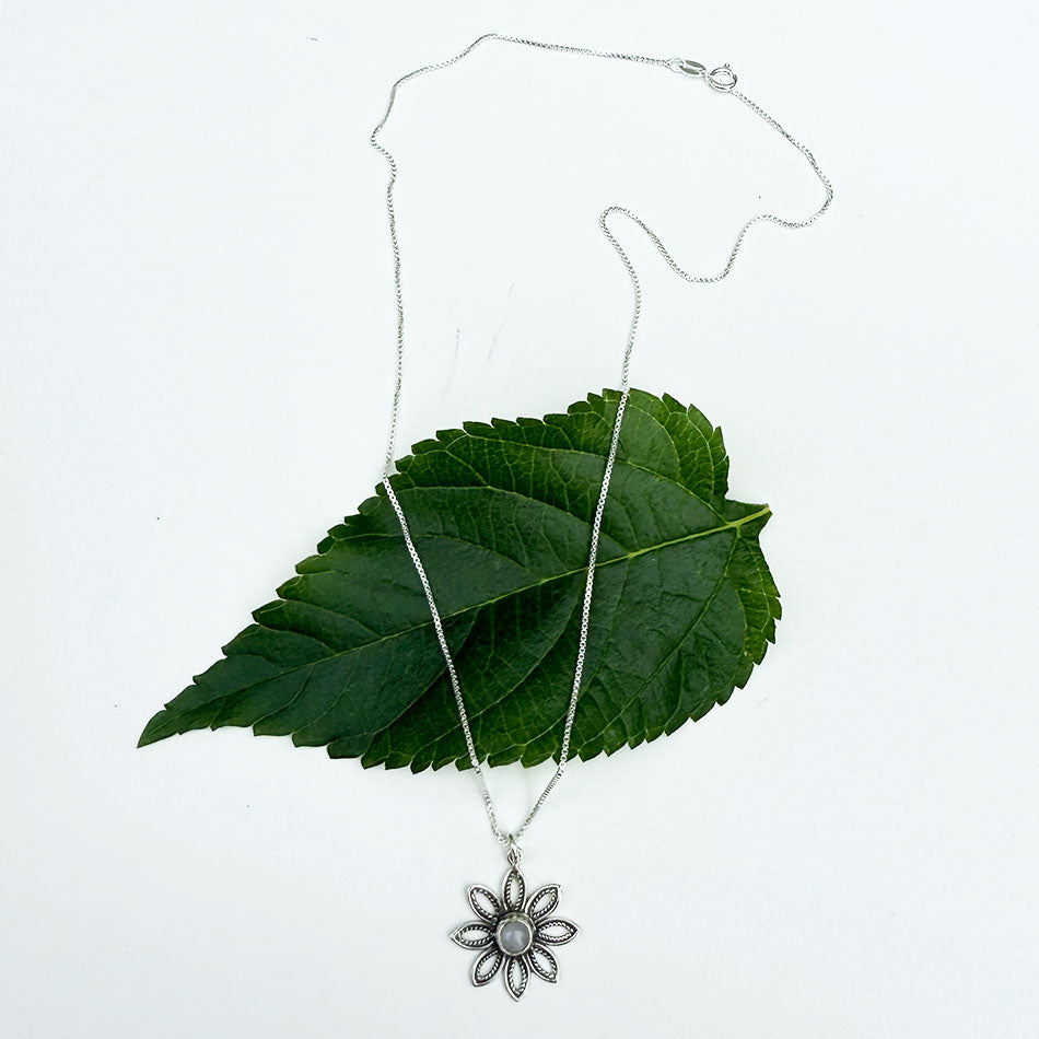 Fair trade sterling silver moonstone flower necklace.