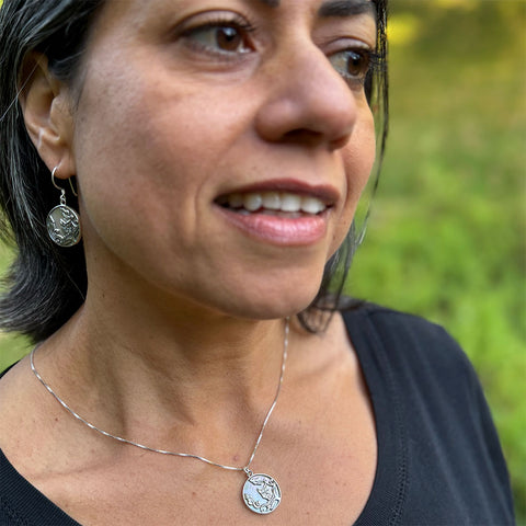 Fair trade mother-of-pearl sterling silver owl necklace.