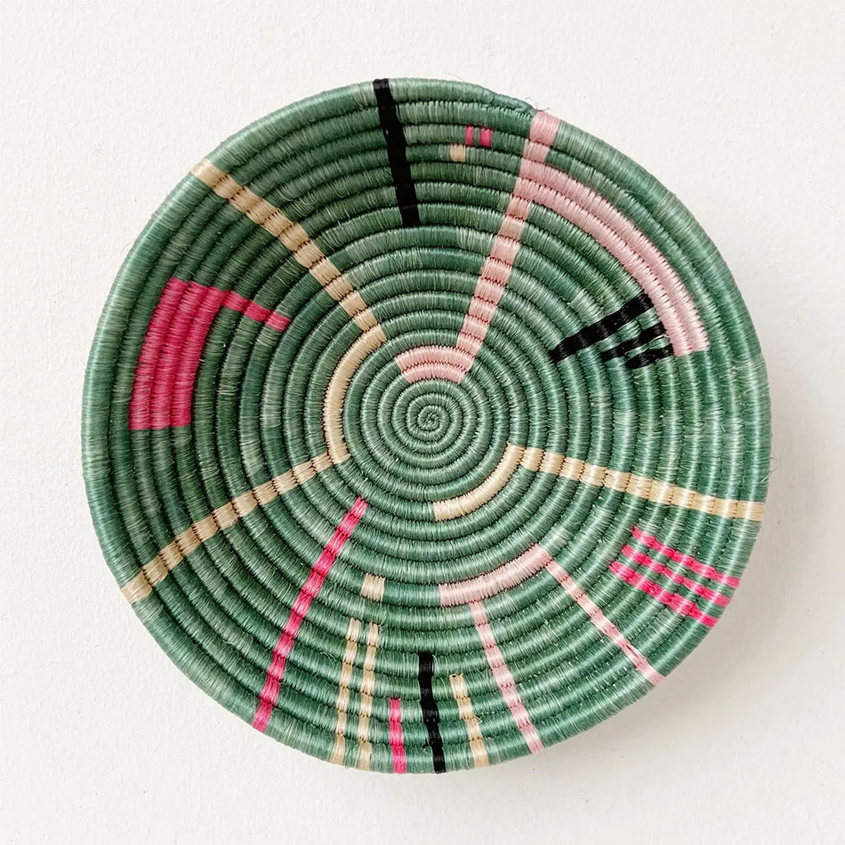 Fair trade sisal bowl basket with sweetgrass, green with pink and black modern design handmade in Rwanda.