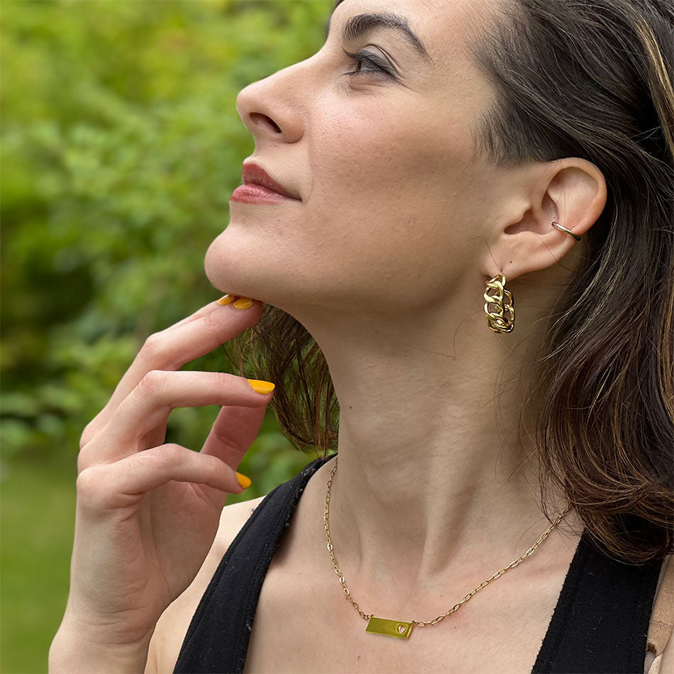 Fair trade gold earrings handmade by survivors of human trafficking