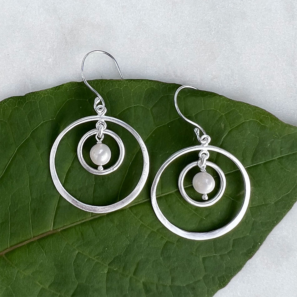 Fair trade sterling pearl hoops ethically handmade