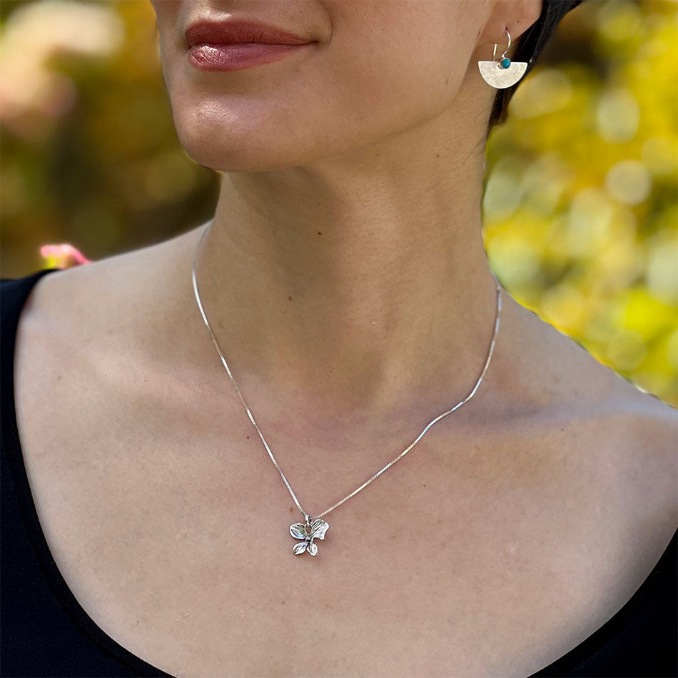 Fair trade sterling silver flower necklace handmade by artisans in Bali
