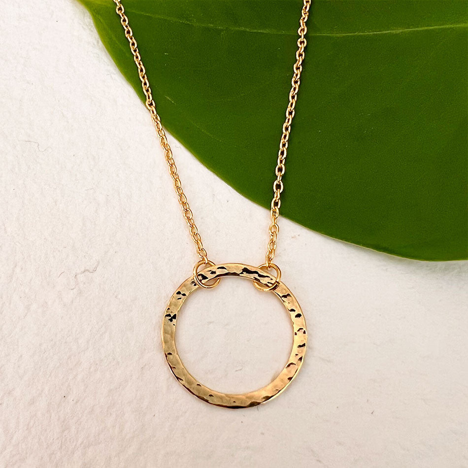 Fair trade brass necklace handmade by survivors of human trafficking
