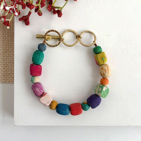 Fair trade recycled bracelet handmade by women artisans in India