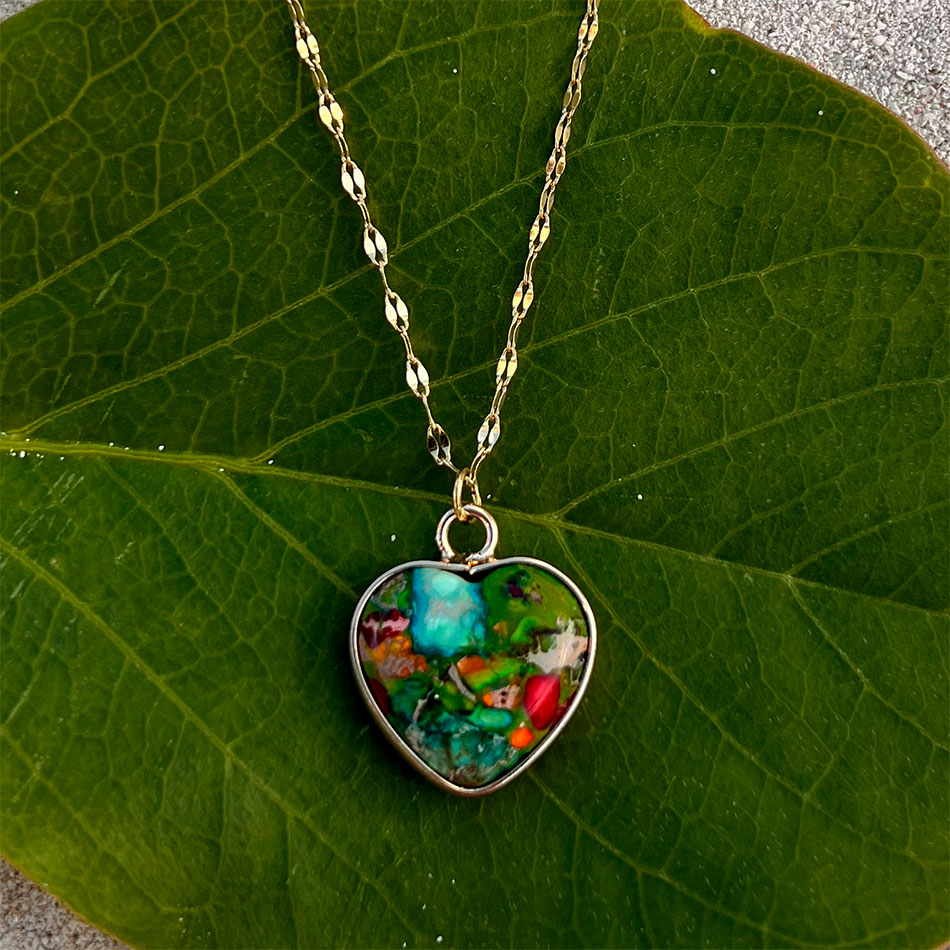 Fair trade heart necklace handmade by survivors of human trafficking