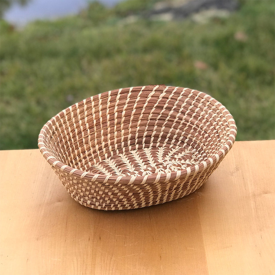 Fair trade gift basket made of pine needles