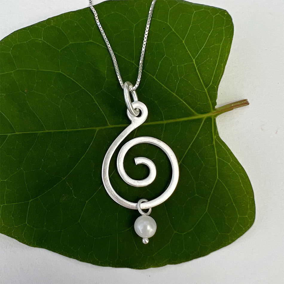 Sterling silver spiral pearl necklace handmade by artisans in Bali
