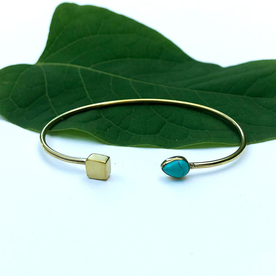 Fair trade turquoise brass cuff handmade by artisans in India