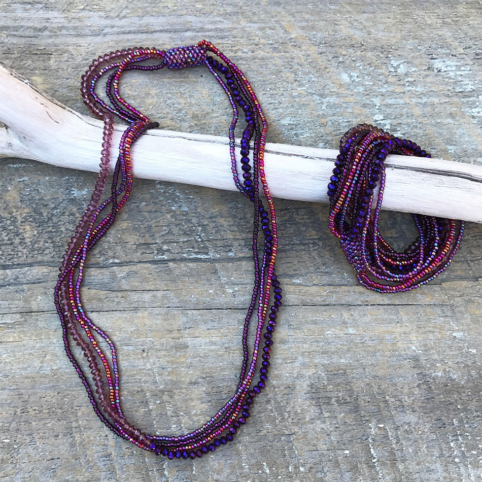 Purple tones beaded bracelet/necklace with magnetic clasp.